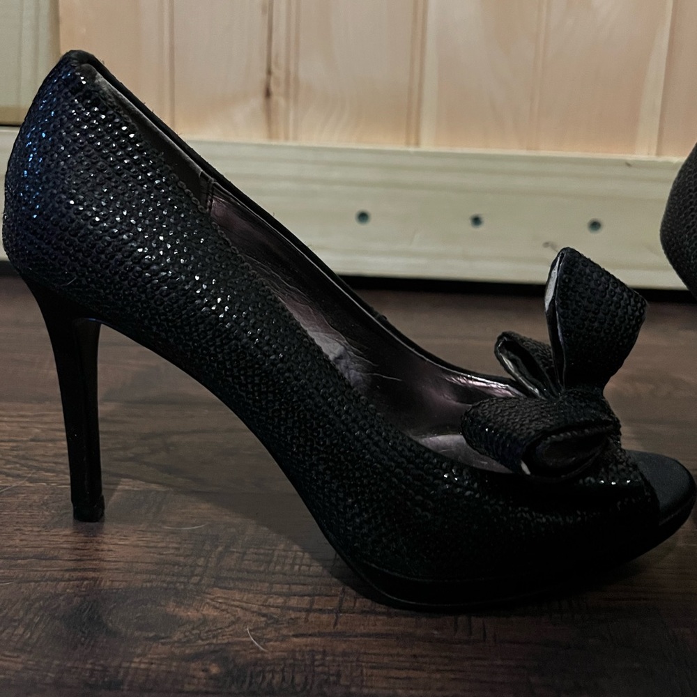 Black sequin moda size 8 heels .